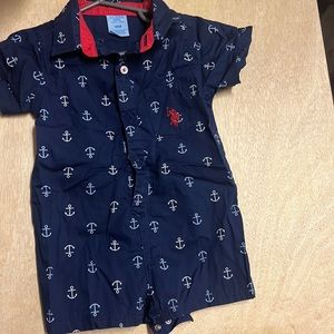 Polo red, white, and navy shortall. Excellent used condition. Size 18M.